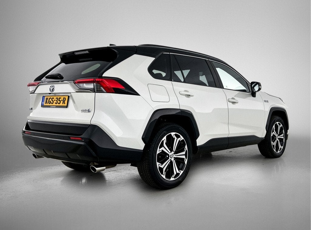 Toyota RAV4 2.5 Plug-in Hybrid AWD Bi-Tone Plus | Premium ui, Auto's, Toyota, Automaat, 12 maanden, Gebruikt, 4 cilinders