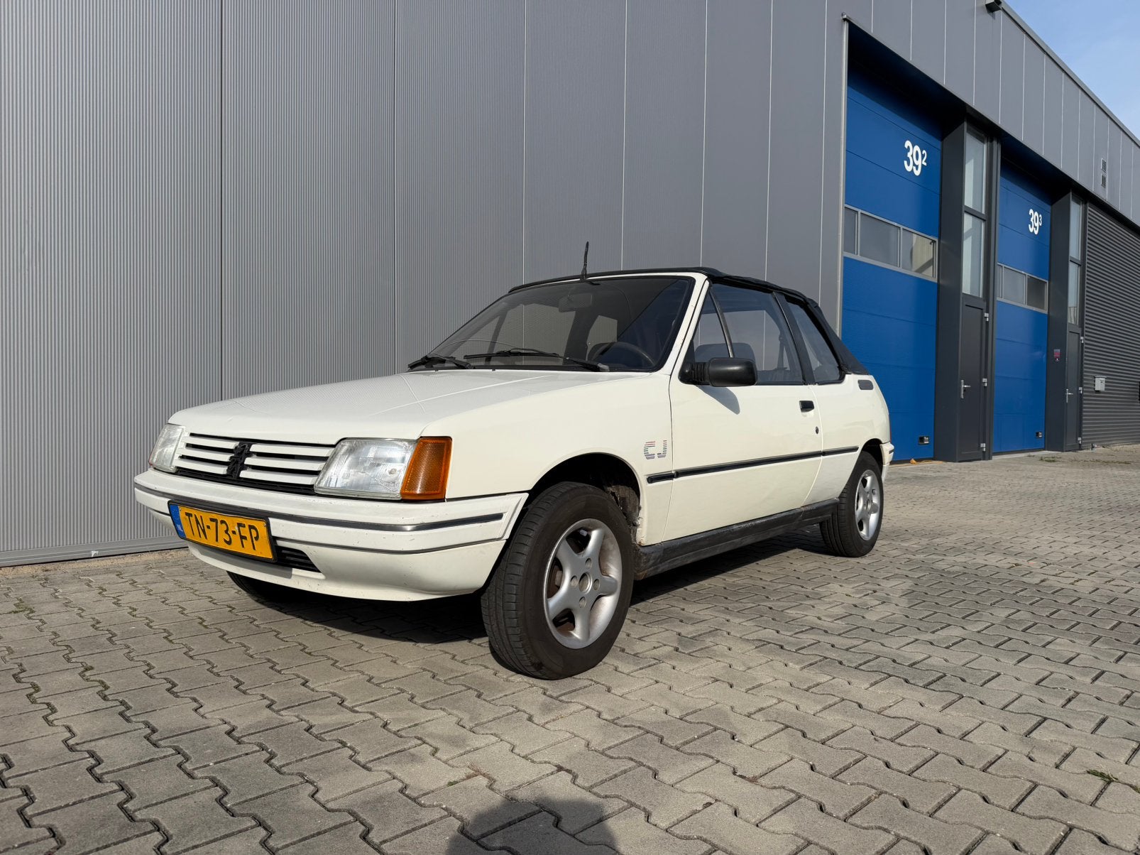 Peugeot 205 1.4 CJ Cabriolet S6 1988 Wit, Auto's, Voorwielaandrijving, Stof, 1360 cc, 4 cilinders