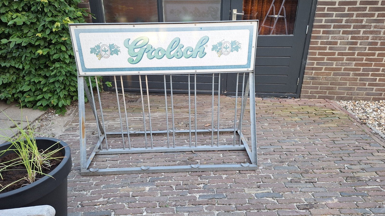 Grolsch fietsenrek, Ophalen
