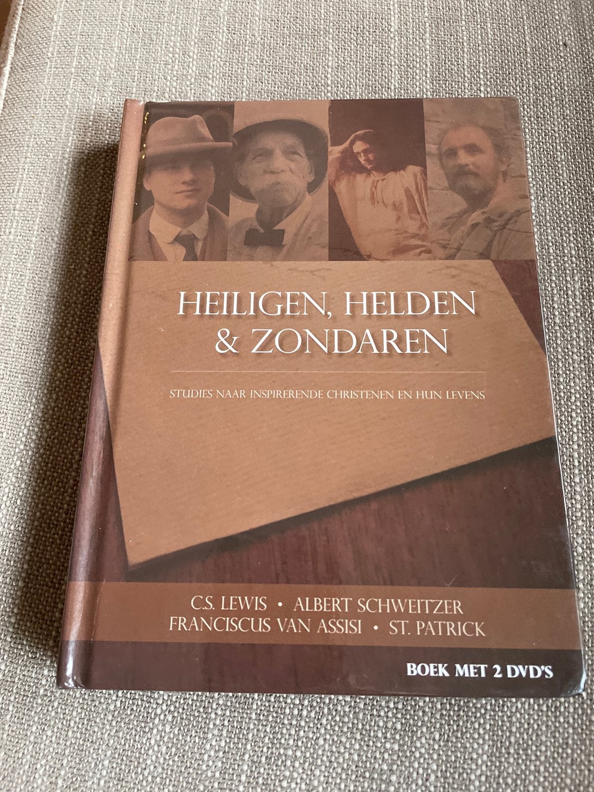 Heiligen, Helden & Zondaren - Boek met 2 dvd’s, Boeken, Ophalen of Verzenden, Zo goed als nieuw, Christendom | Protestants