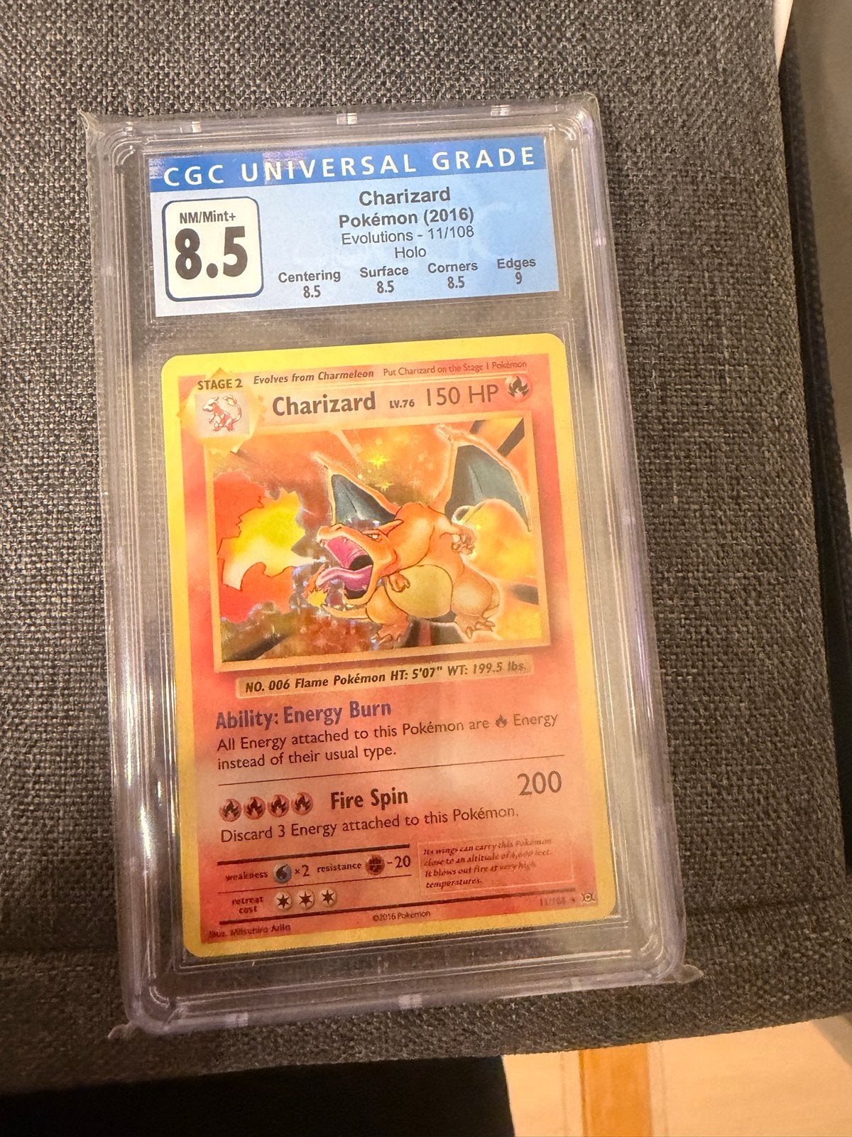 CGC Graded Charizard Pokémon Kaart 2016 Evolutions 8.5, Ophalen of Verzenden, Zo goed als nieuw, Losse kaart