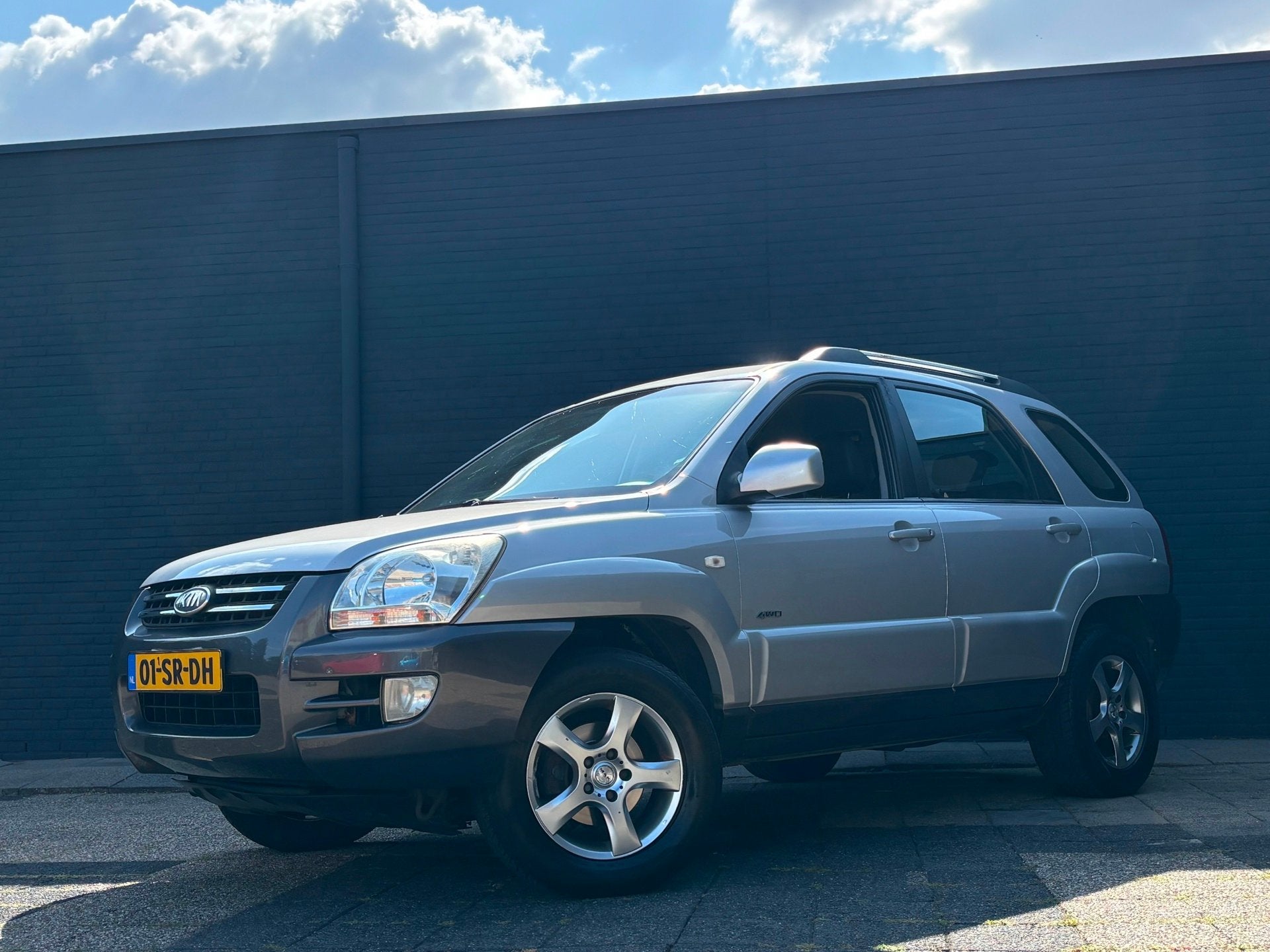 Kia Sportage 2.7 V6 Adventure 4WD|Automaat|Leder|Trekhaak, Auto's, Kia, Automaat, Gebruikt, 2656 cc, Stoelverwarming