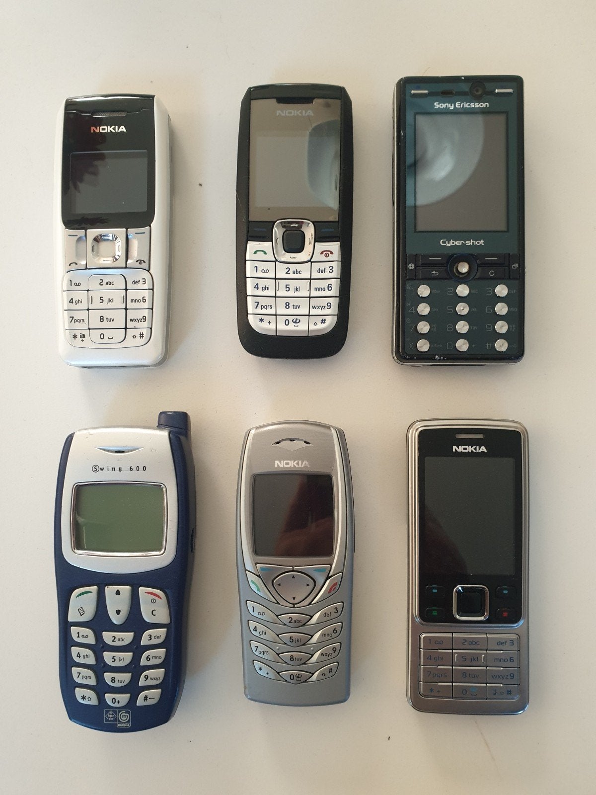 Diverse oude telefoons - Nokia, Apple, Sony Ericsson, Gebruikt, Overige kleuren, Fysiek toetsenbord, Ophalen of Verzenden