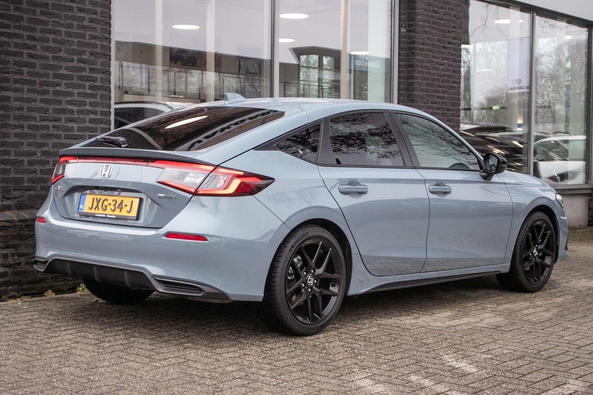 Honda Civic 2.0 e:HEV Sport | Honda Sensing | Apple cp/Andro, Auto's, Gebruikt, 4 cilinders, Leder en Stof, Bedrijf