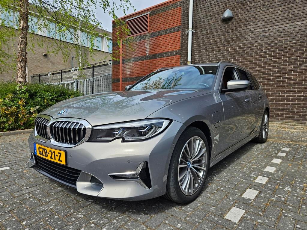 BMW 3-Serie 330e Leer/Pano/Head-up/Keyless/360°/Laser, Auto's, BMW, 1998 cc, Achterwielaandrijving, 4 cilinders, Stationwagon