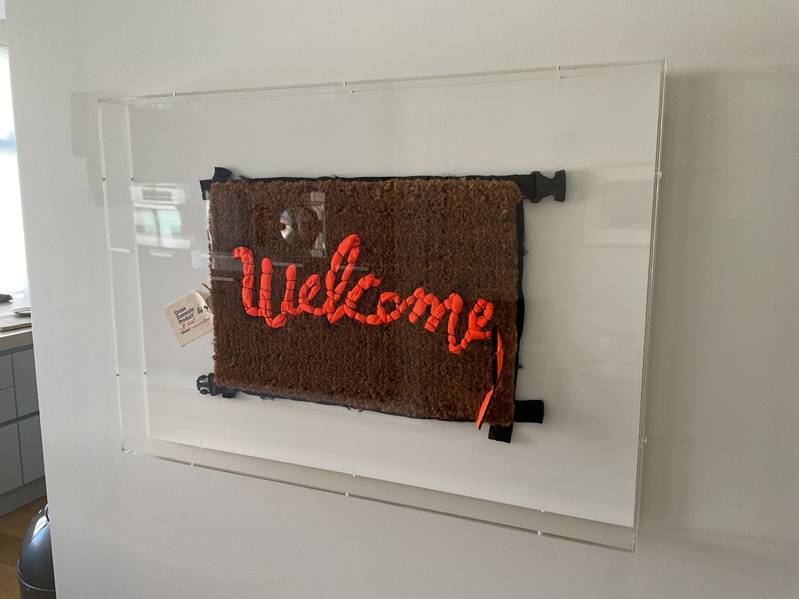 Banksy welcome mat in plexi-box, Ophalen