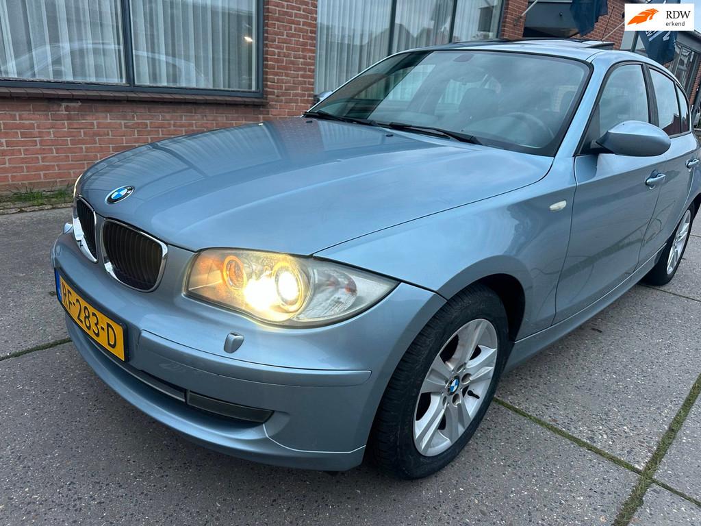 BMW 1-serie 118i High Executive AUTOMAAT Schuif-dak duurste, Auto's, BMW, Blauw, Geïmporteerd, 1275 kg, 1-Serie