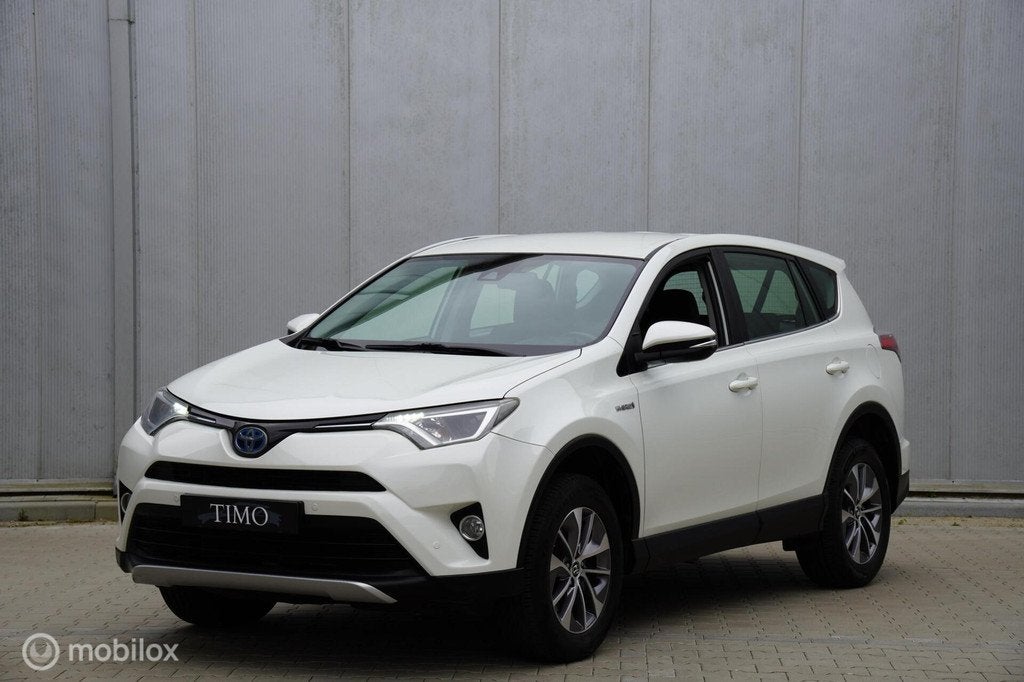 Toyota RAV4 2.5 Hybrid Dynamic 104.011 KM, Auto's, Gebruikt, Wit, Bedrijf, Hybride Elektrisch/Benzine