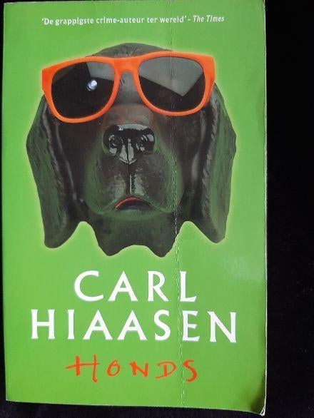 Honds: Carl Hiaassen, Ophalen of Verzenden, Zo goed als nieuw