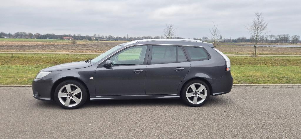 Saab 9-3 1.8 T Estate 2010 Grijs LPG G3, Auto's, Saab, 1998 cc, 4 cilinders, Overige bekleding, 1498 kg