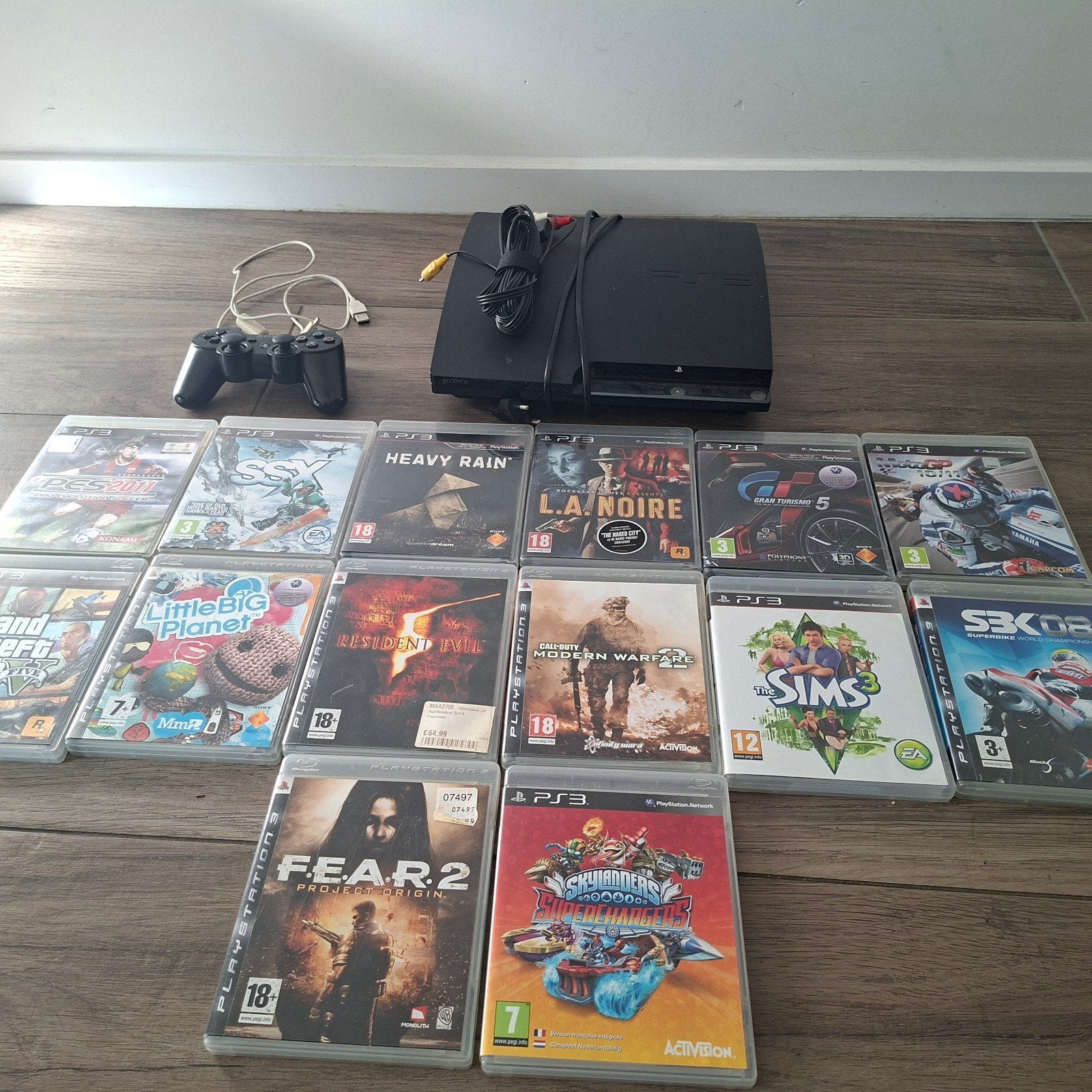 PlayStation 3 met 14 spellen en controller, Gebruikt, Vanaf 18 jaar, Overige genres, Ophalen of Verzenden