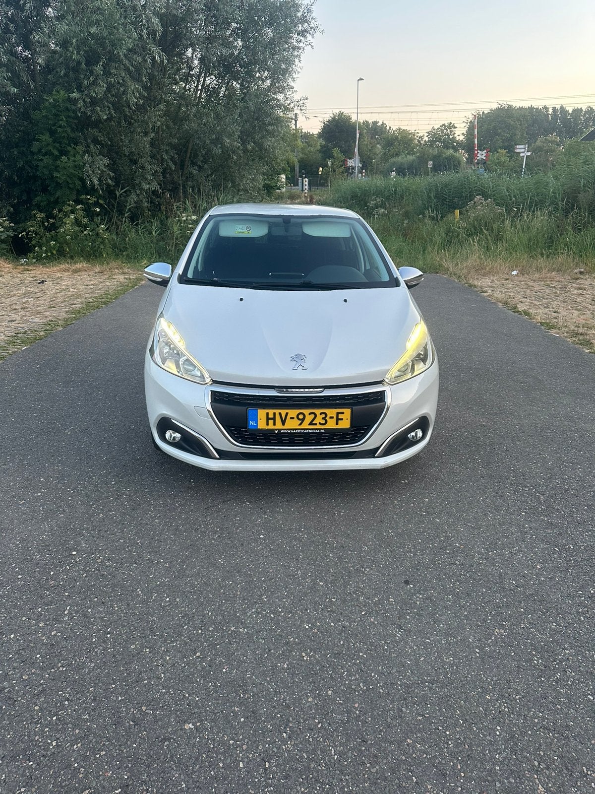 Peugeot 208 1.2 VTI 60KW/82PK 5-D 2016 Parelmoer Wit, Auto's, Voorwielaandrijving, 31 €/maand, 1199 cc, Origineel Nederlands