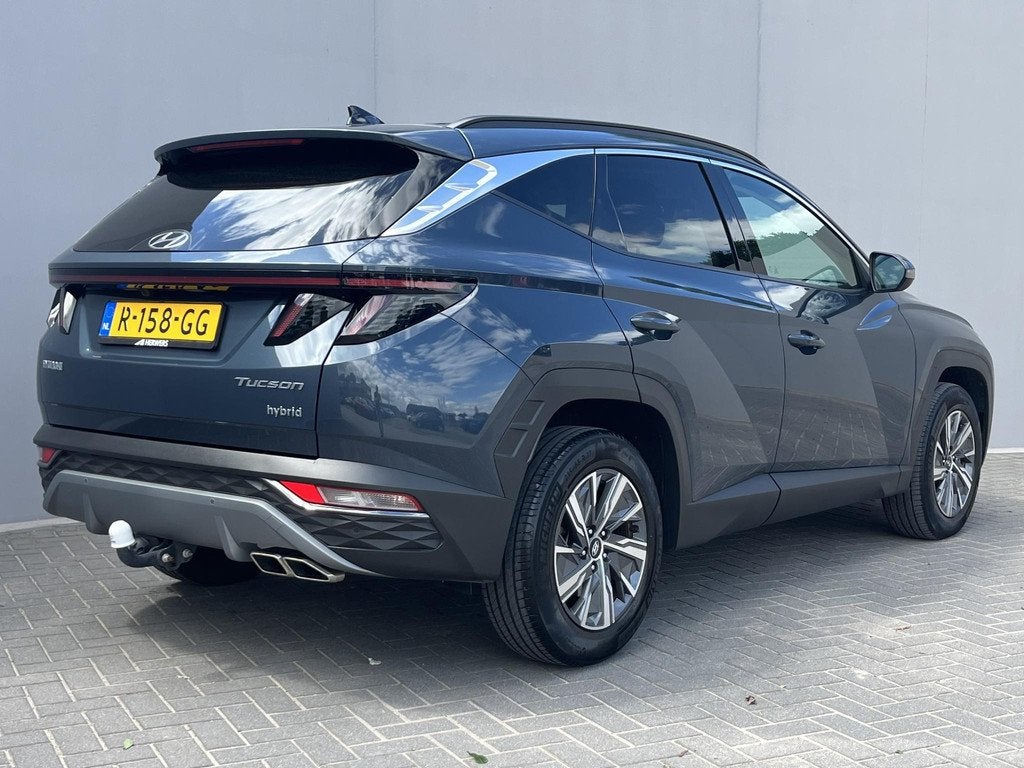 Hyundai Tucson 1.6 T-GDI HEV Comfort / Trekhaak (1.650KG) /, Auto's, Hyundai, Stof, Gebruikt, Euro 6, 4 cilinders