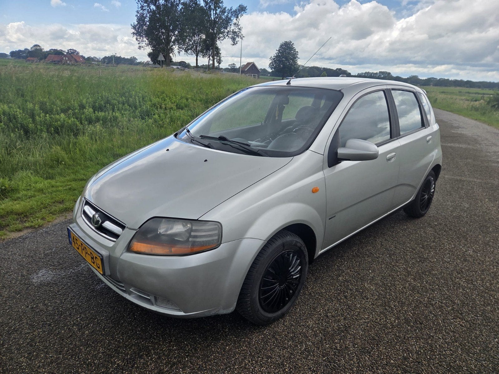 Daewoo Kalos 1.4 16V ((AUTOMAAT)) 2004 Grijs, Auto's, Daewoo, Stof, 40 €/maand, 4 cilinders, Bedrijf