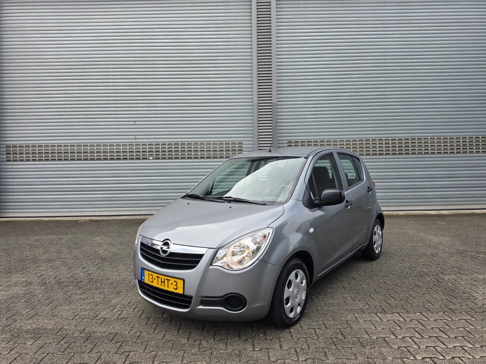 Opel Agila 1.0 12V 2012 Grijs, Auto's, Origineel Nederlands, Bedrijf, Handgeschakeld, 3 cilinders