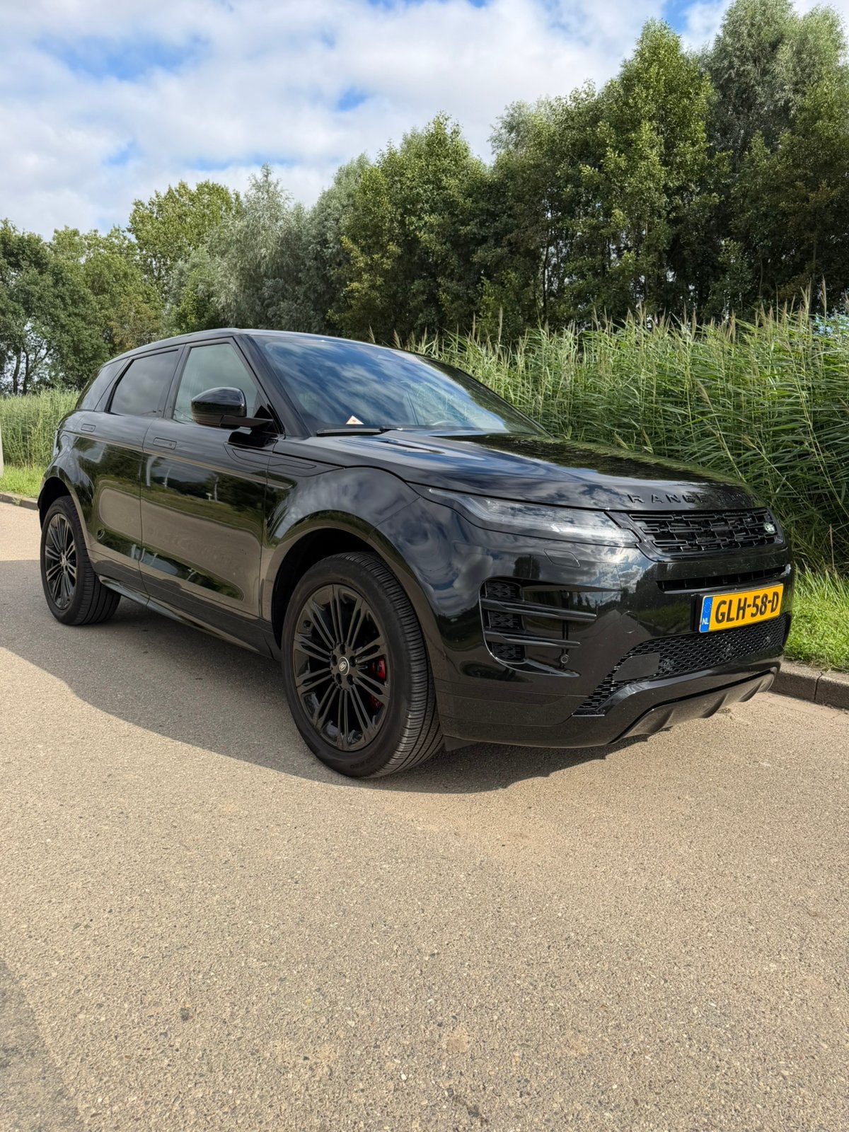 Land Rover Range Rover Evoque P270e Dynamic HSE, Auto's, Land Rover, Automaat, Verblindingsvrij grootlicht, 1498 cc, Zwart