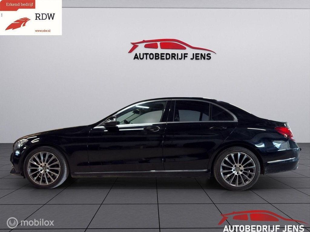 Mercedes C-klasse 200 Prestige, Auto's, Achterwielaandrijving, Gebruikt, Euro 6, Zwart