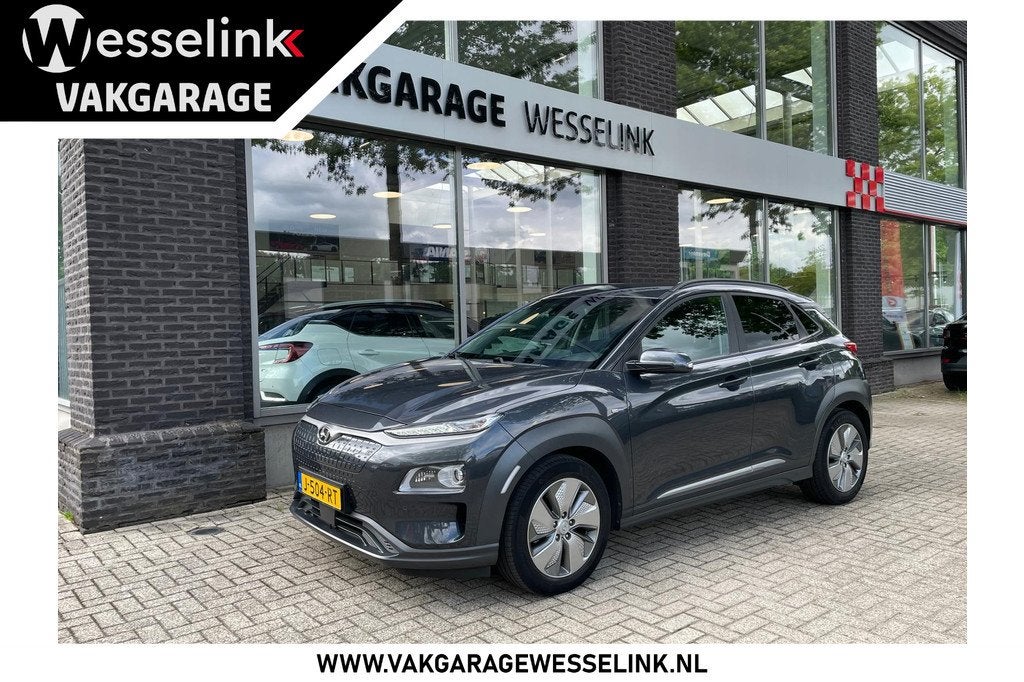 Hyundai KONA EV Premium 64 kWh | SOH 100% | Stoelverw. + ven, Auto's, Hyundai, 12 maanden, Gebruikt, Zwart, 39 min