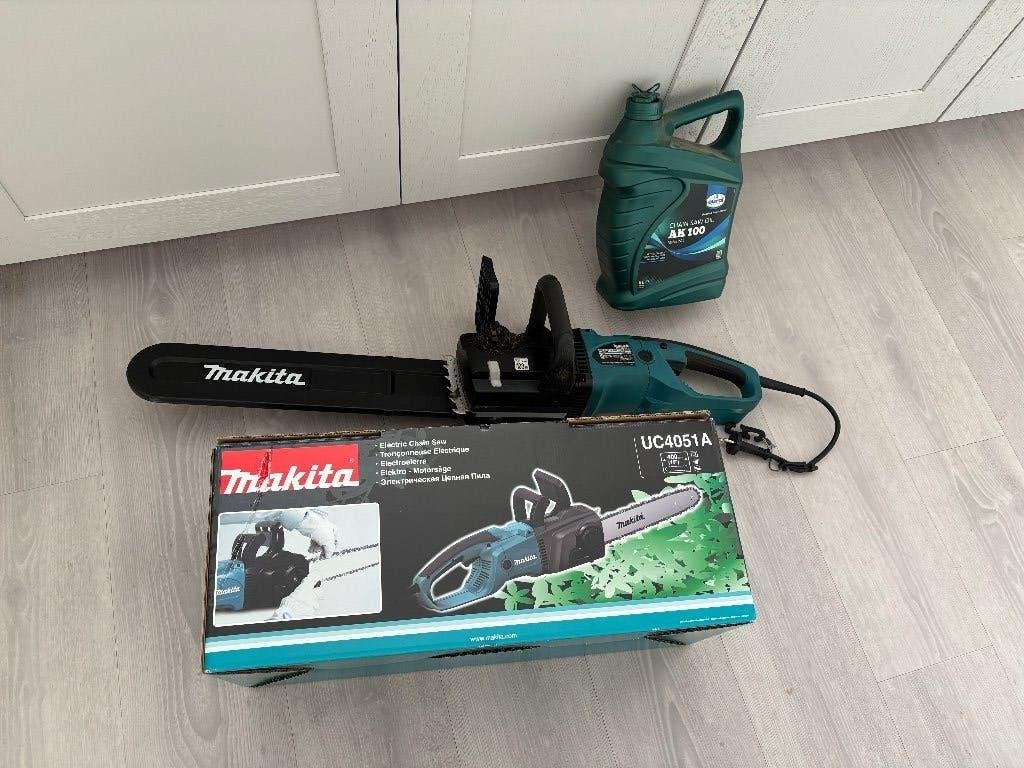 Makita elektrische kettingzaag (incl. doos en olie), Tuin en Terras, Ophalen, Zo goed als nieuw