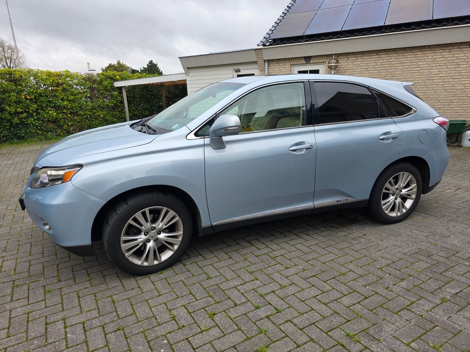 Lexus RX(-H) 450h Hybrid 299pk CVT 2009 Blauw, Auto's, Automaat, 249 pk, Beige, 2000 kg