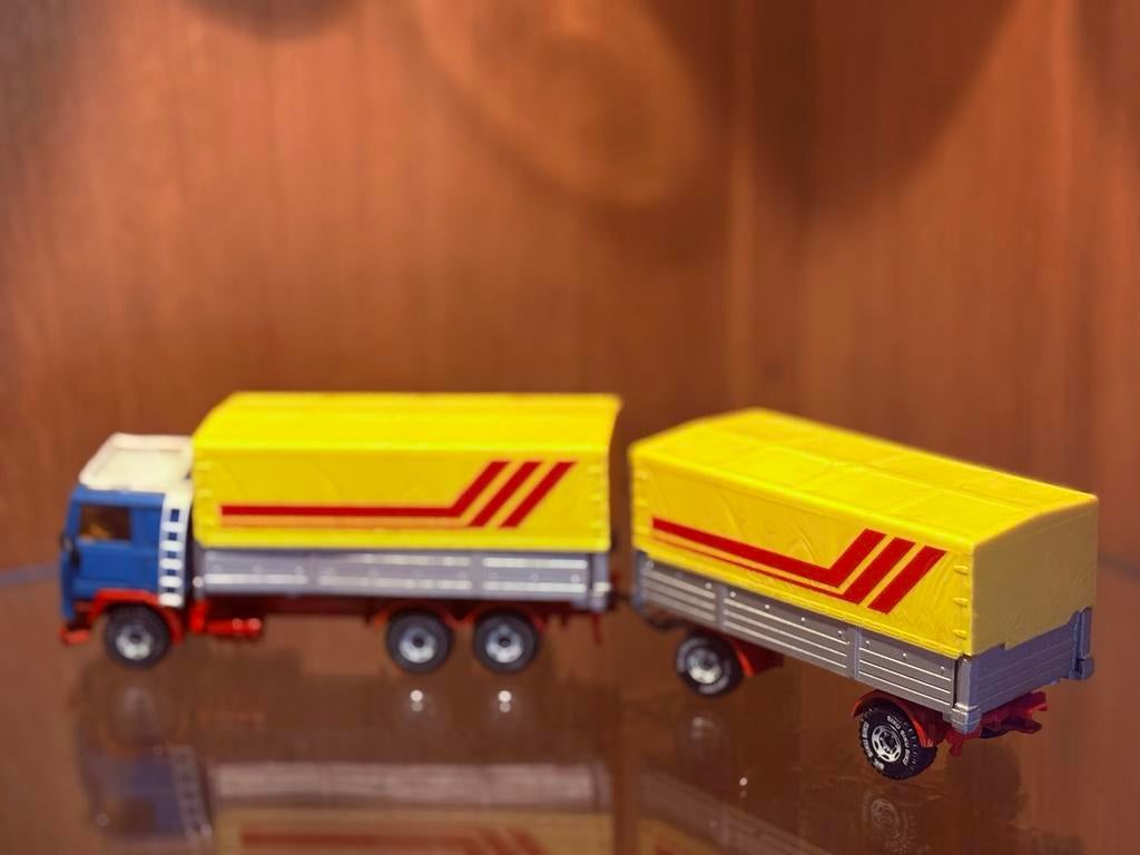Siku Volvo F12 Turbo 6 DHL Modelauto, Ophalen of Verzenden, Gebruikt, Auto