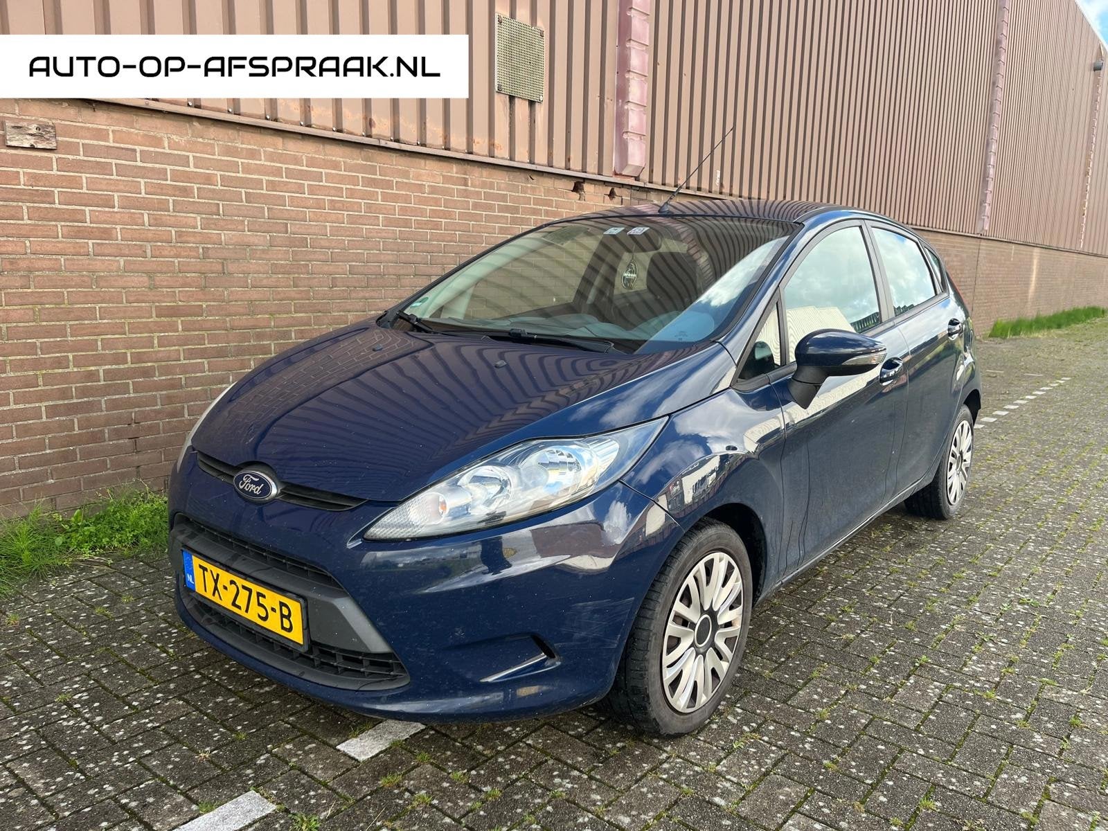 Ford Fiesta 1.25 Limited 5drs. Airco NAP APK, Voorwielaandrijving, Stof, 1242 cc, 4 cilinders