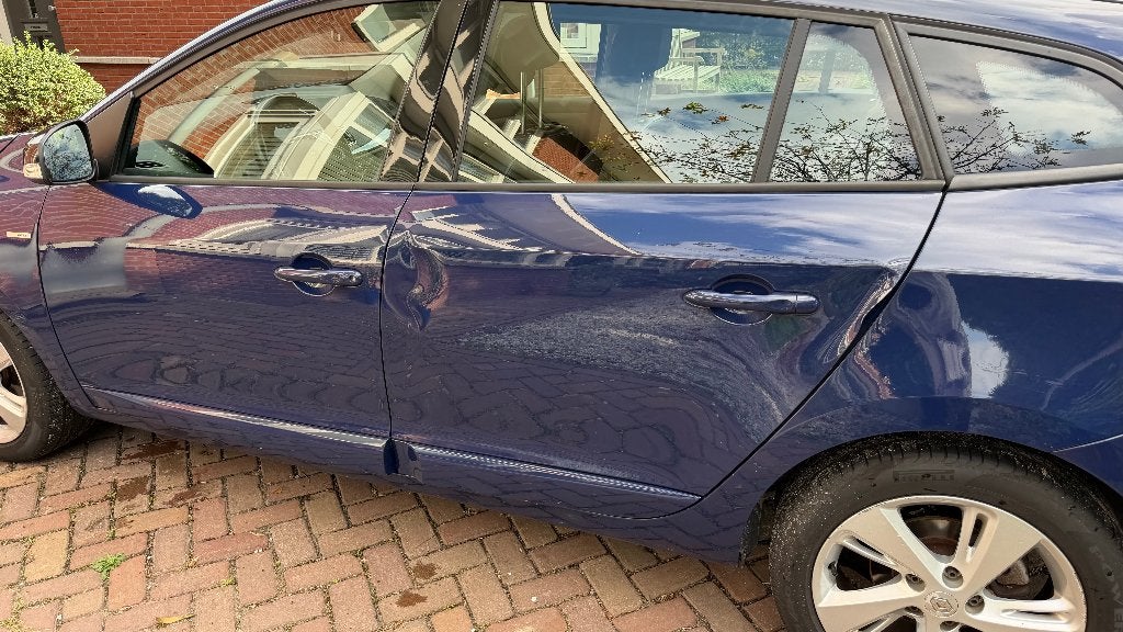 Foto 7 van Renault Mégane 1.5 DCI 81KW Estate 2012 met winterbanden