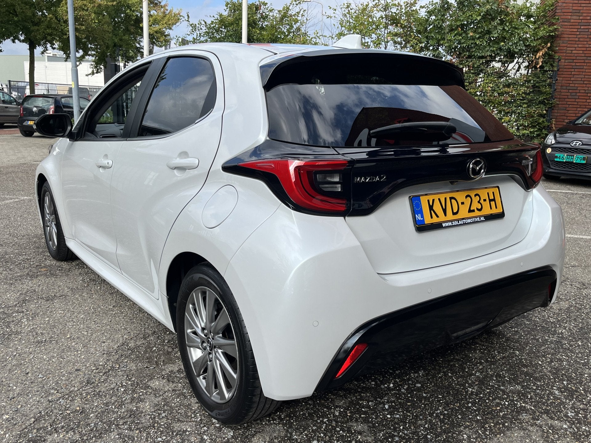 Mazda 2 Hybrid 1.5 Homura Plus // PANORAMADAK! // ADAPTIVE C, Auto's, Dealer onderhouden, 450 kg, Gebruikt, Zwart