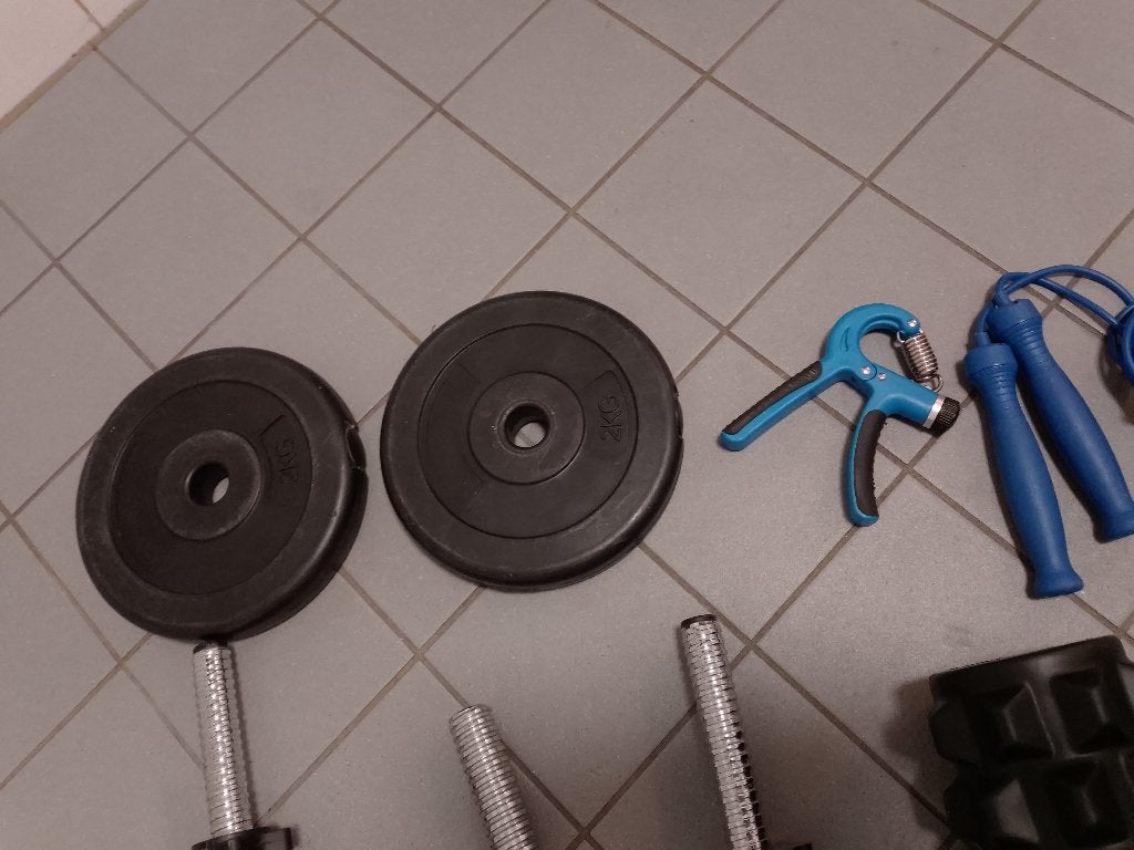 Complete Verstelbare Halterset Tunturi schijf & extra halter, Sport en Fitness, Fitnessmaterialen, Ophalen of Verzenden, Gebruikt