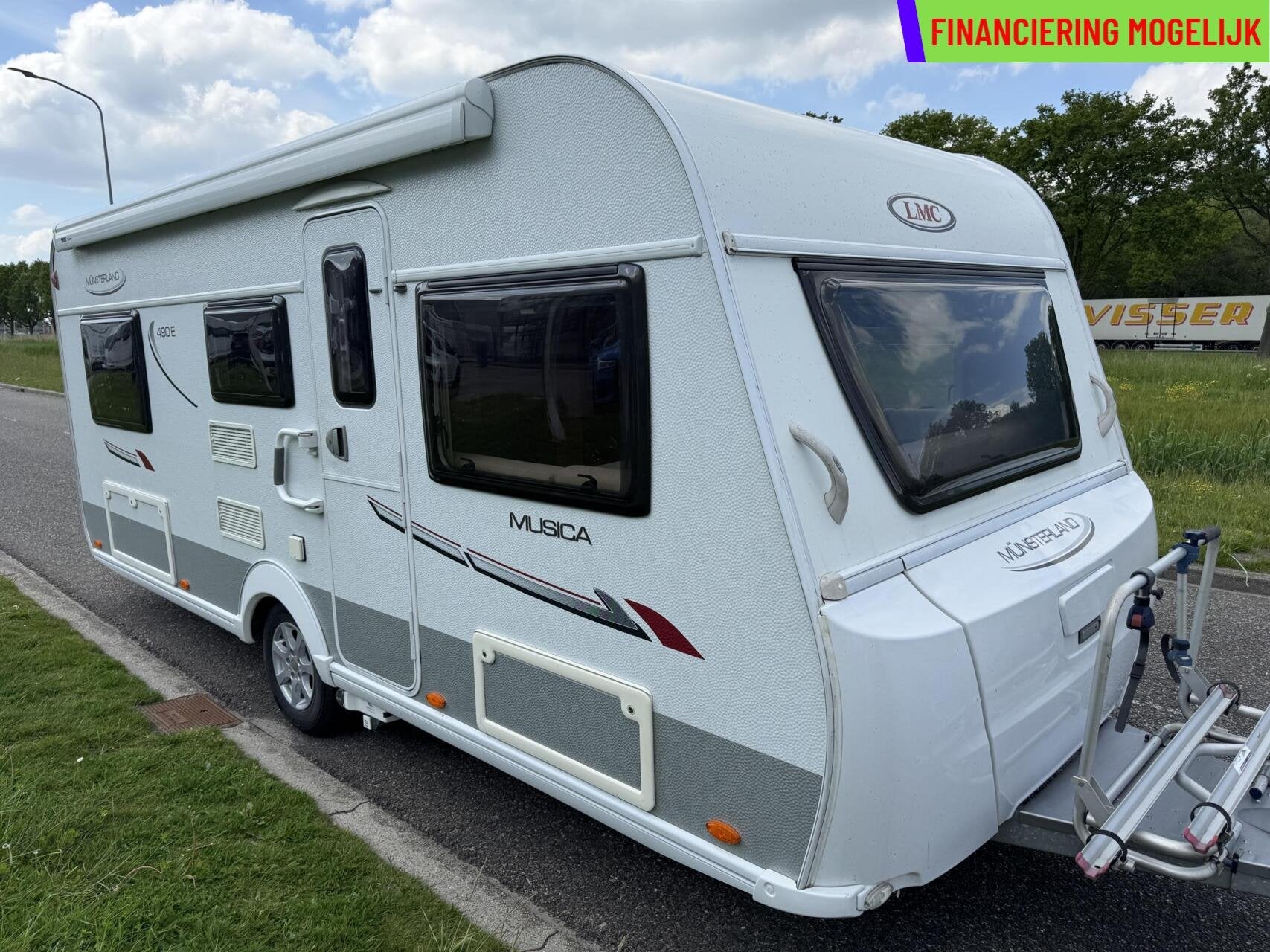 LMC MUNSTERLAND MUSICA 490 E MOVER + LUIFEL + SCHOTEL + TV, Rondzit, 7 tot 8 meter, Bedrijf, Hordeur