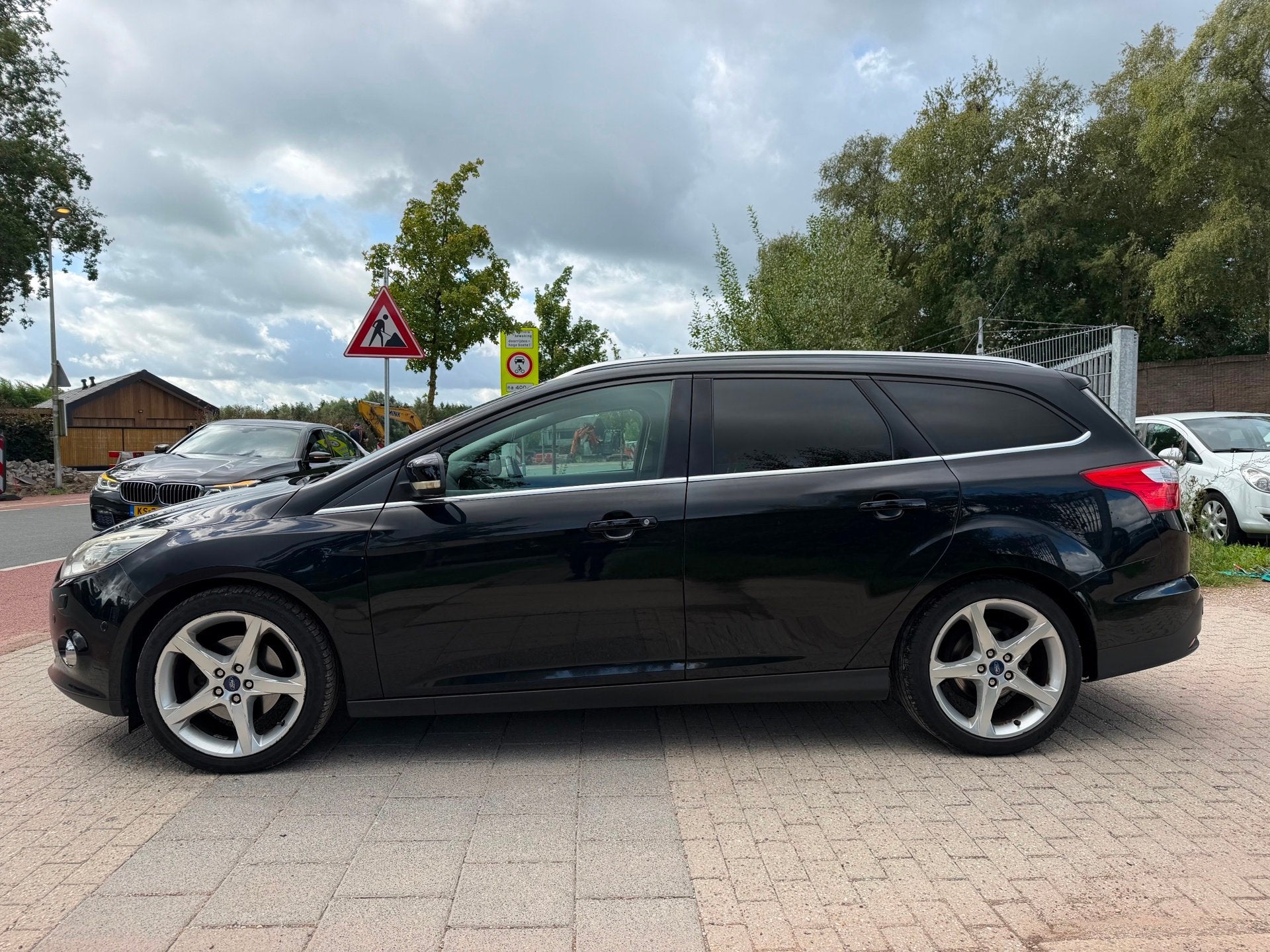Ford Focus Wagon 1.6 EcoBoost Titanium, Auto's, 1258 kg, 4 cilinders, 150 pk, Zwart