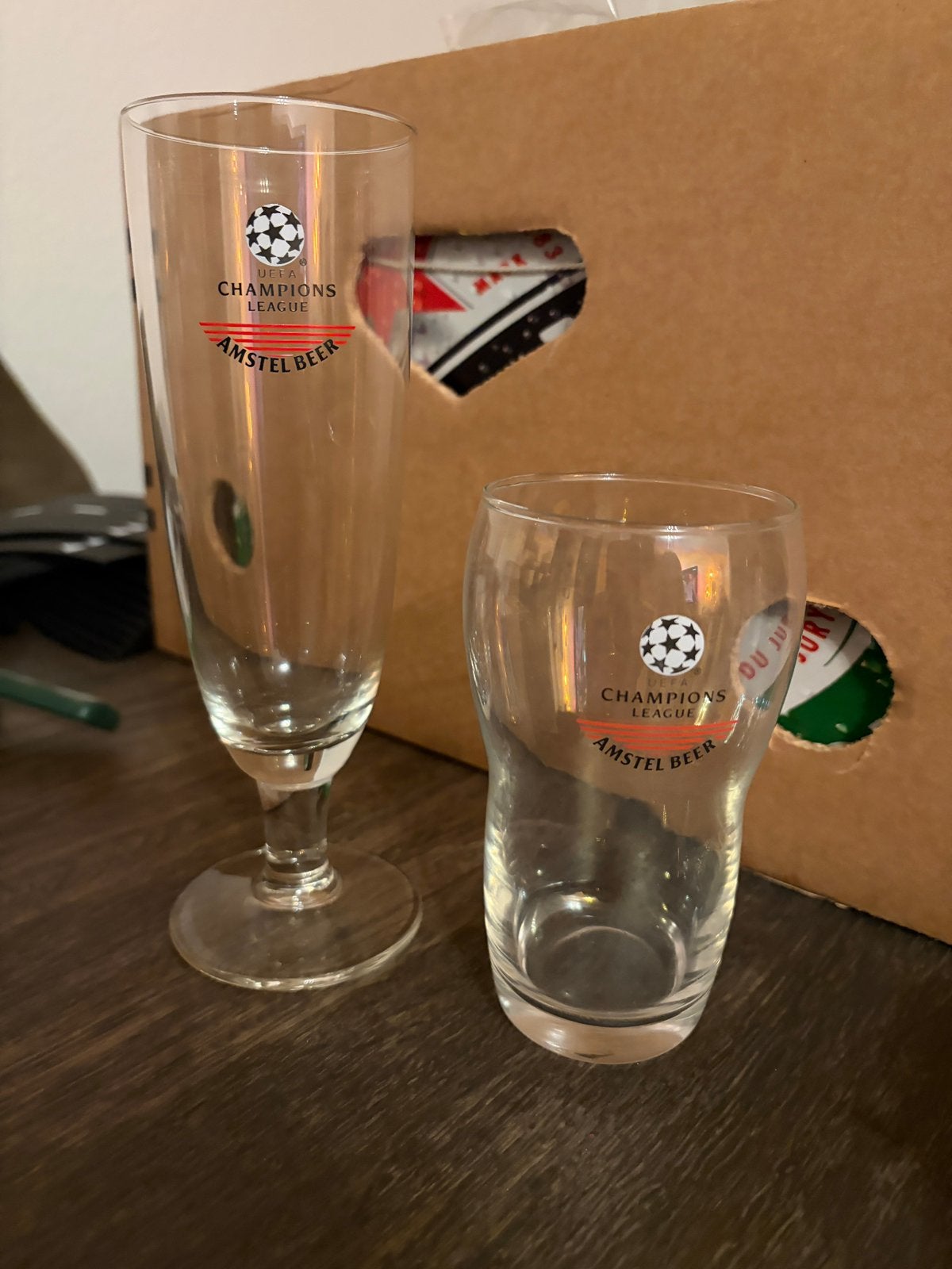 Set Amstel Beer glazen Champions League voet en stapel glas, Ophalen of Verzenden, Nieuw, Glas of Glazen, Amstel