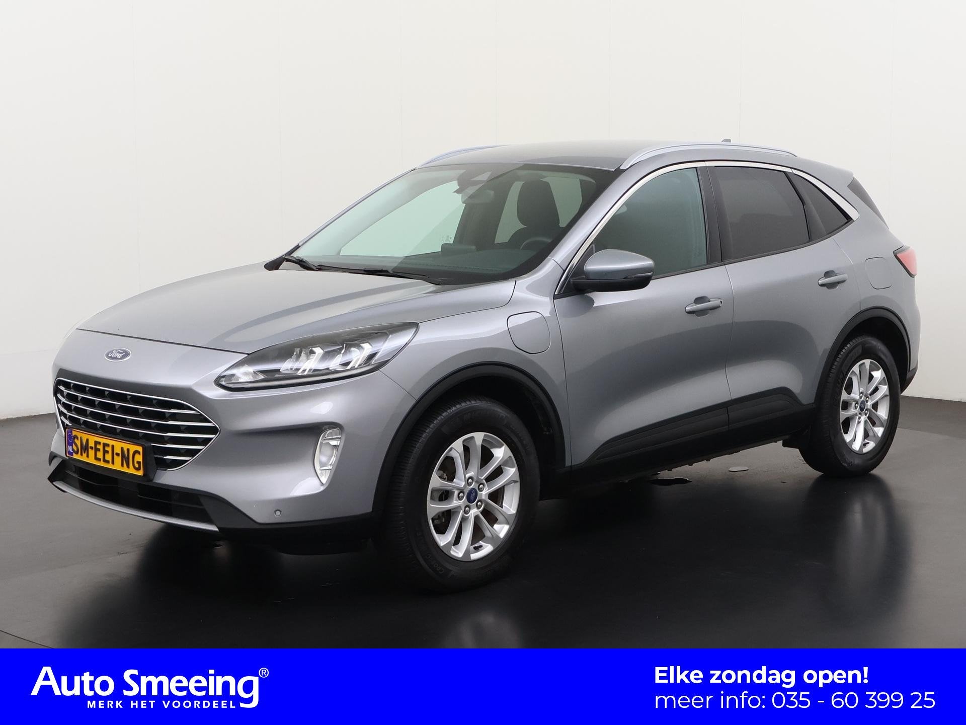 Ford Kuga 2.5 PHEV Titanium | Trekhaak | Stuurverwarming | Z, Auto's, Gebruikt, Euro 6, 4 cilinders, Plug-in hybride