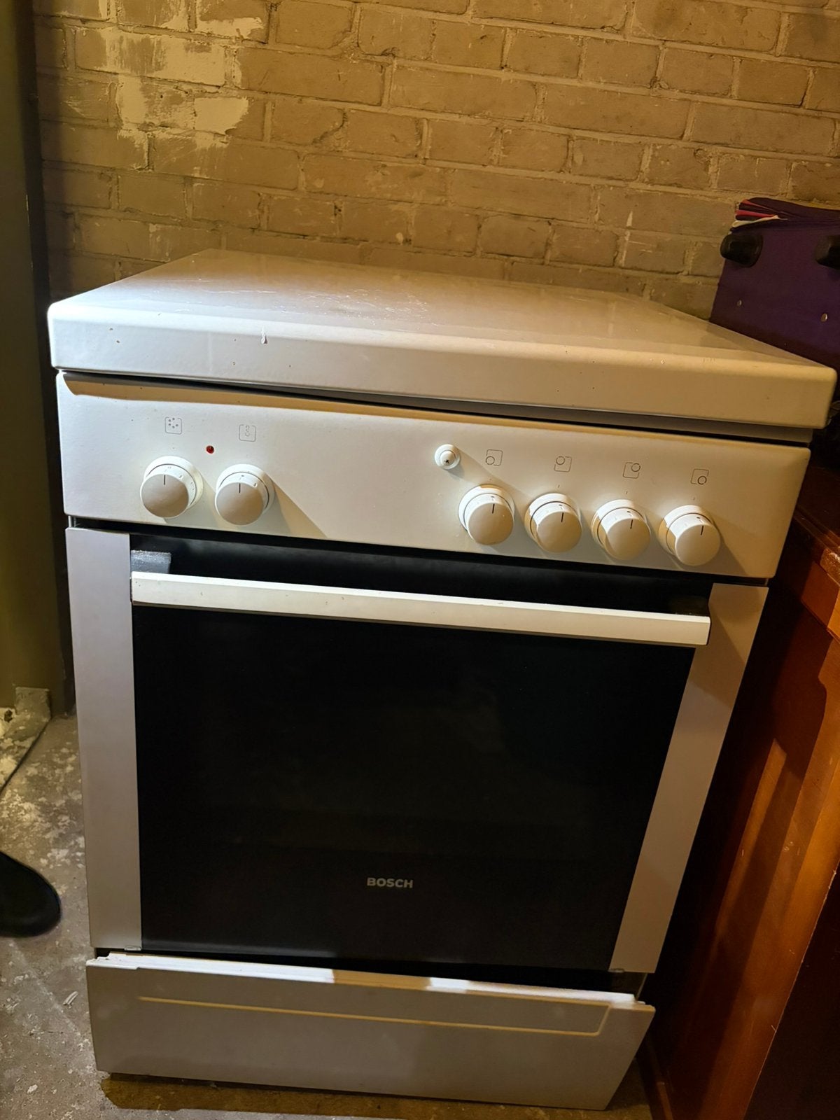 Bosch gasfornuis, Ophalen, 4 kookzones, Zo goed als nieuw, Gas