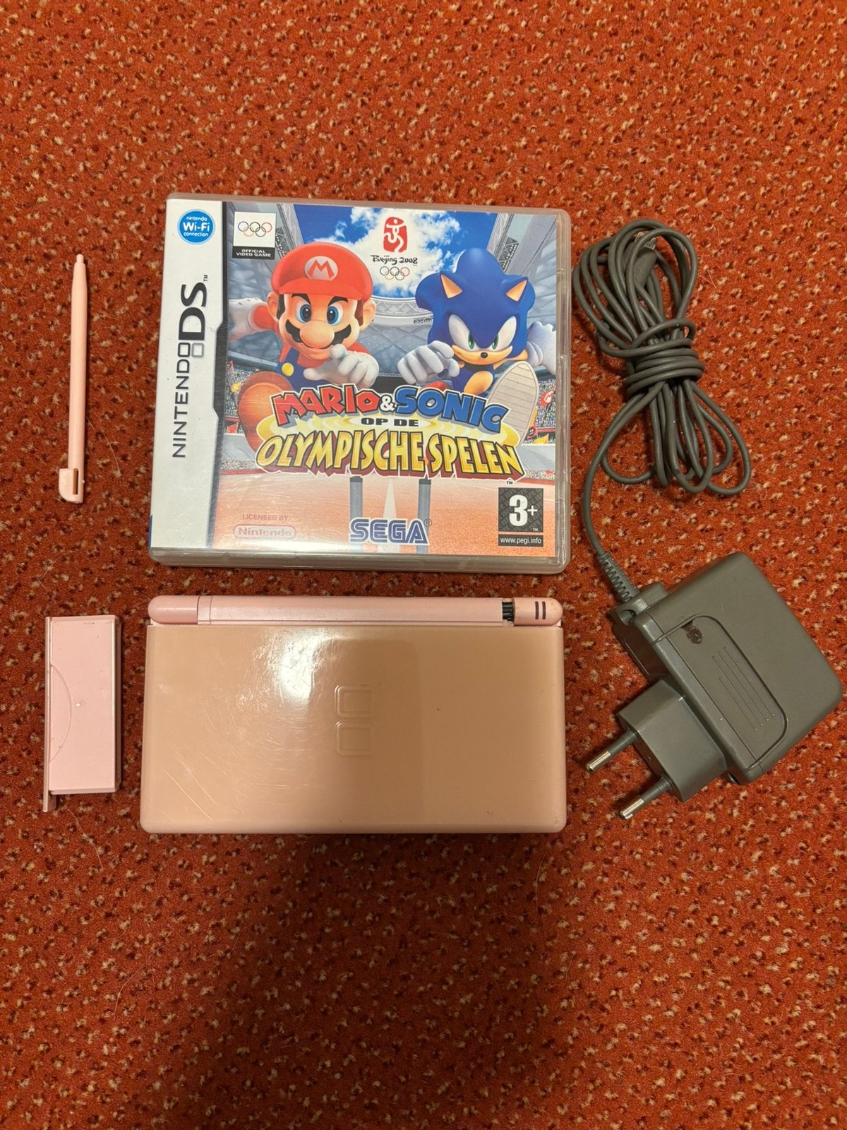 Nintendo DS lite inclusief oplader en mario, Ophalen of Verzenden, Gebruikt, Wit, DS Lite