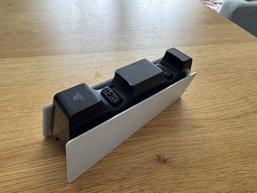 Sony DualSense Oplaadstation, Ophalen of Verzenden, Zo goed als nieuw, Voeding, Oplader of Kabel, PlayStation 5