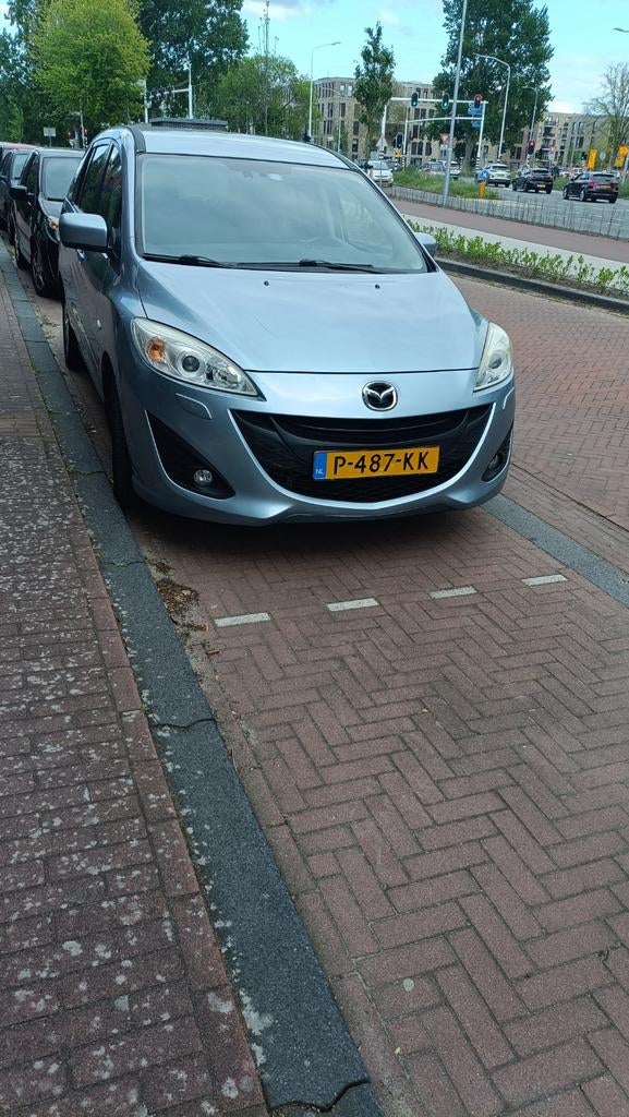 Mazda 5 1.8 115pk 7p 2011, Auto's, Mazda, Voorwielaandrijving, 4 cilinders, 7 stoelen, 14 km/l