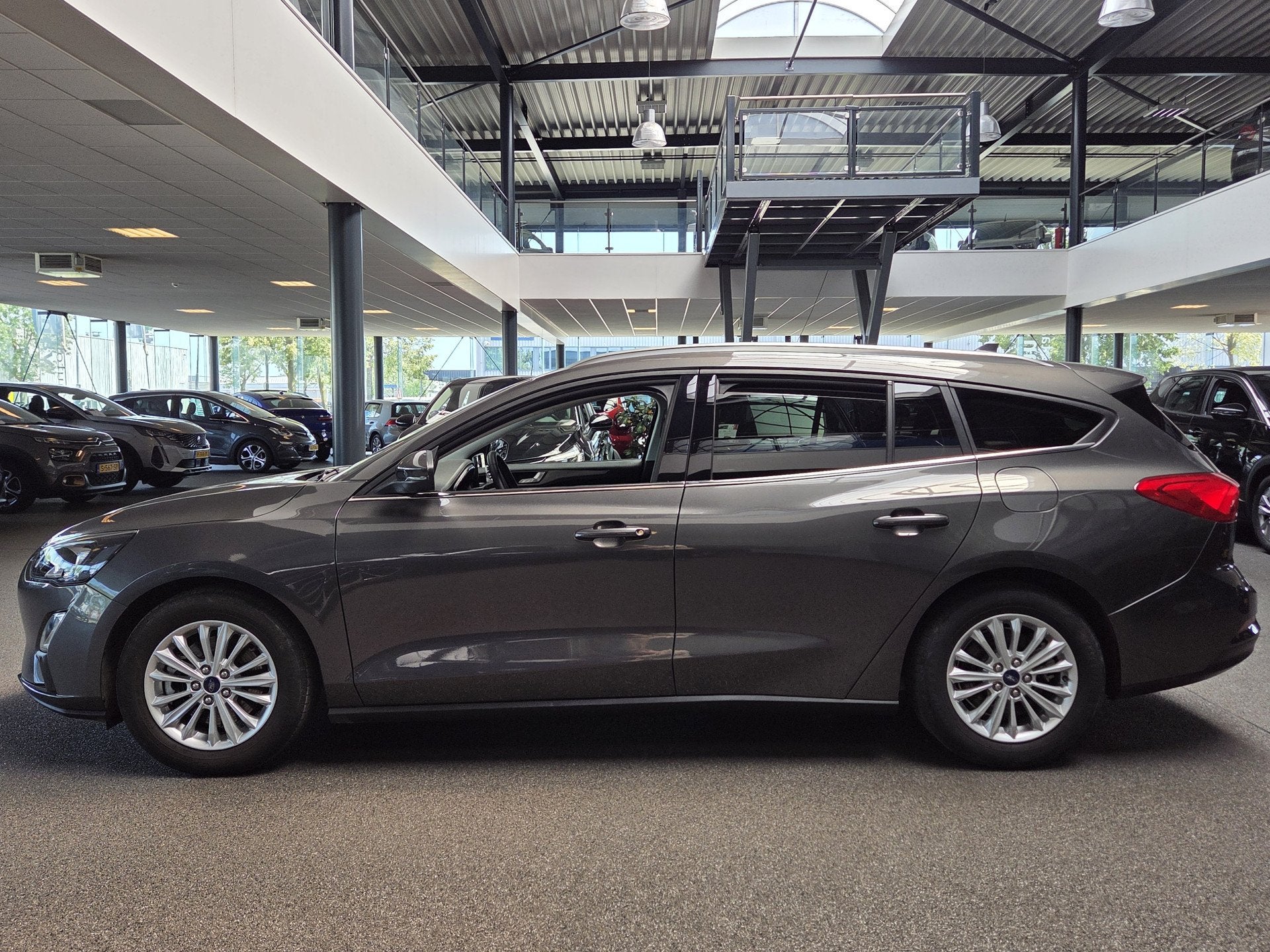 Ford FOCUS Wagon 1.0 EcoBoost Titanium X Business, Ecc, Trek, Gebruikt, Automatische klimaatregeling, Origineel Nederlands, Zilver of Grijs