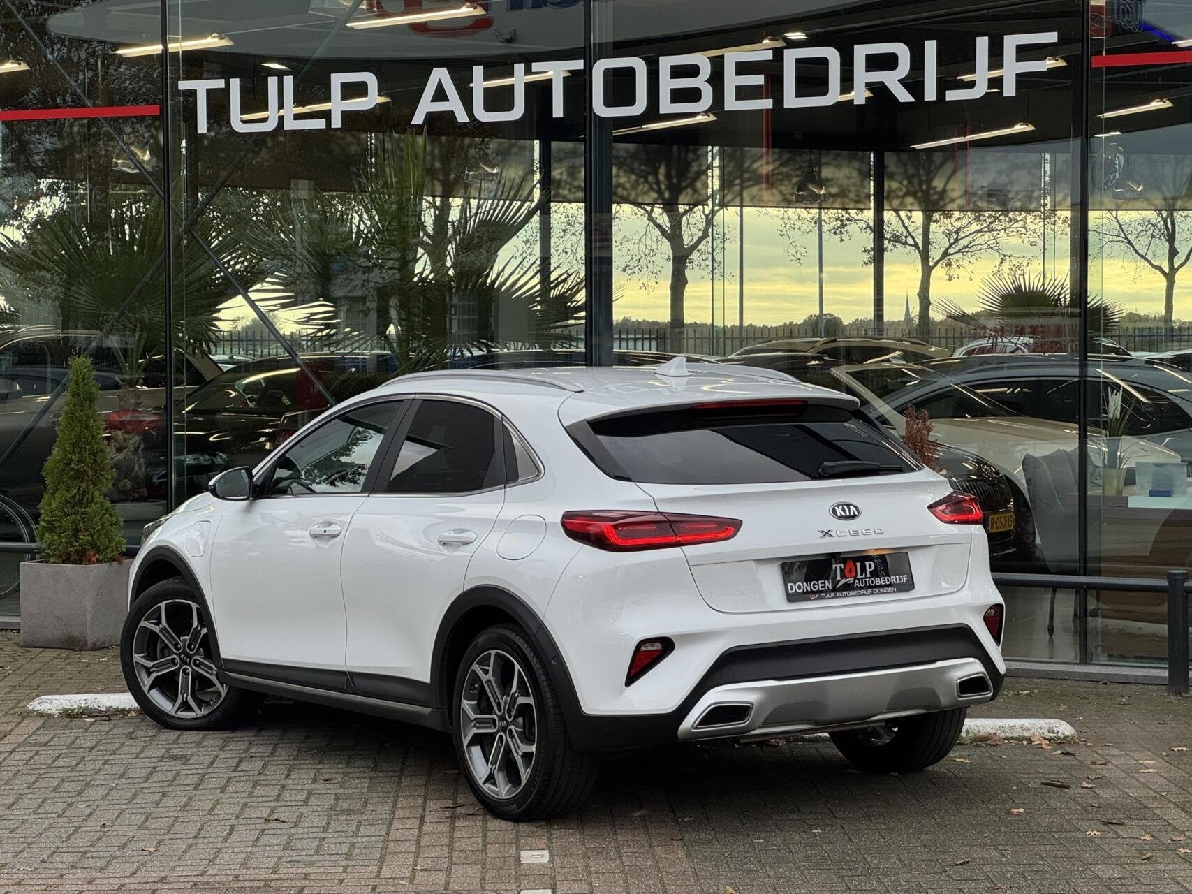 Kia XCeed 1.6 GDi PHEV DCT Sense 2021 Leder 1e eig Full opti, Auto's, Lichtsensor, Gebruikt, Zwart, Wit