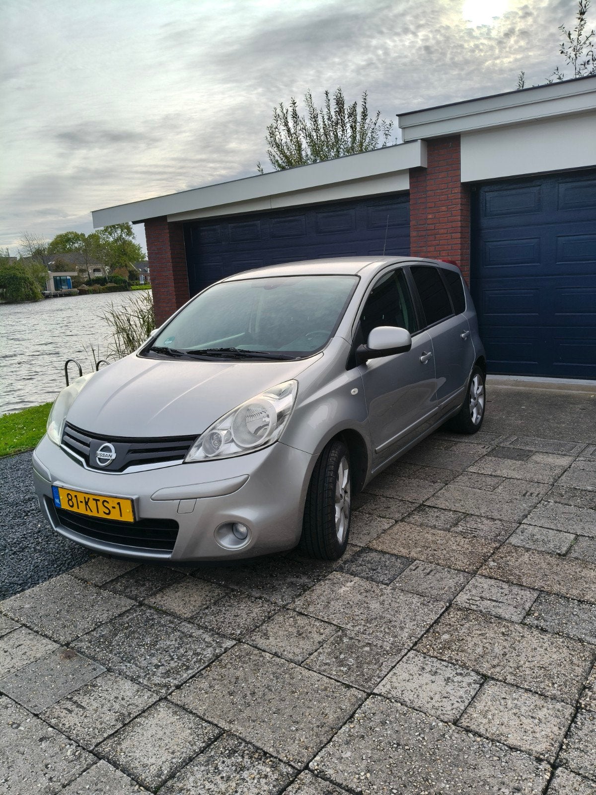 Nissan Note 1.6 16V 2010 Grijs dealer onderhouden, Voorwielaandrijving, 15 km/l, 4 cilinders, 49 €/maand