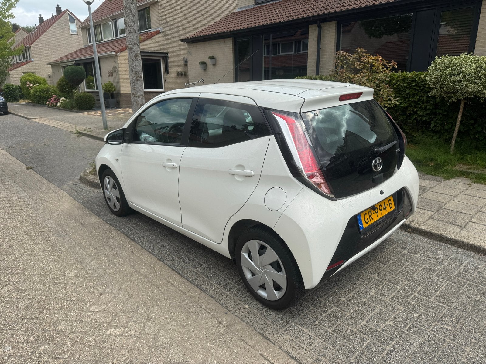 Toyota Aygo 2015 Wit, Fietsen en Brommers, Ophalen, Nieuw
