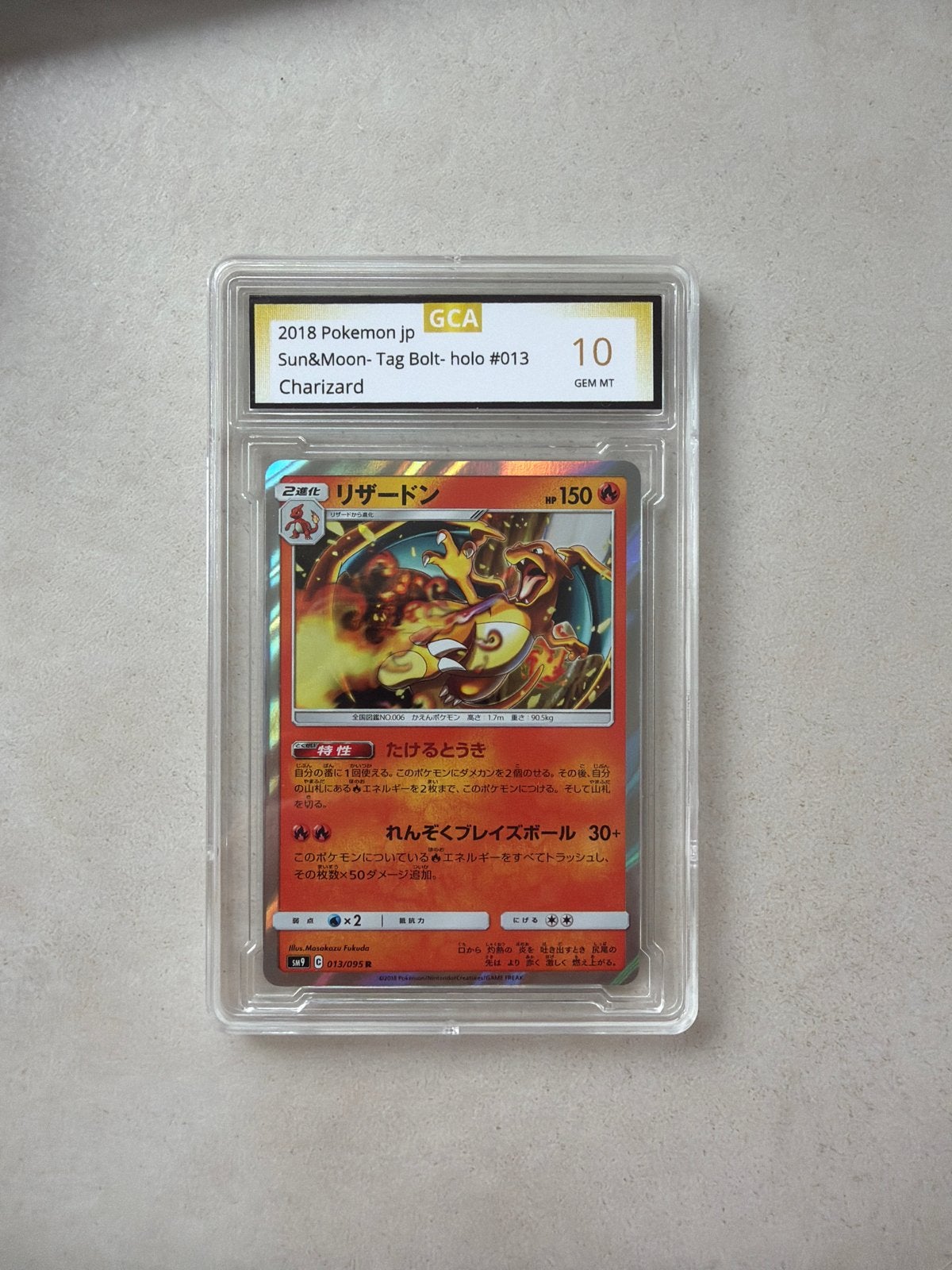 Charizard GCA 10 GEM MT - 2018 Pokemon JP Sun&Moon Tag Bolt, Ophalen of Verzenden, Nieuw, Losse kaart, Foil
