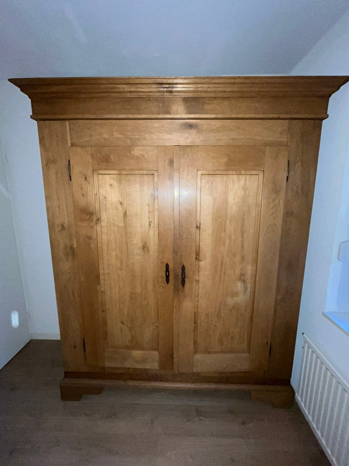 Massief houten kast, Ophalen