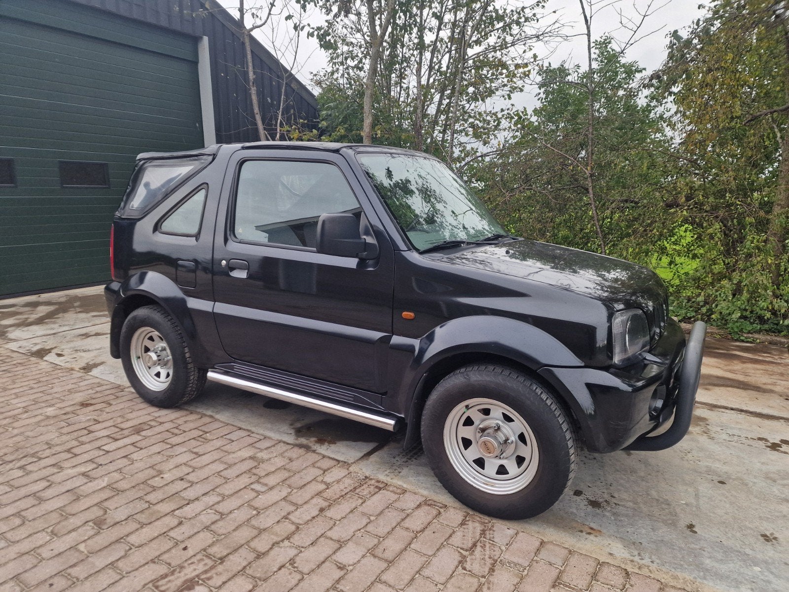 Suzuki Jimny 1.3 Cabrio 4WD 2002 Zwart, Auto's, 13 km/l, Dealer onderhouden, Stof, 40 €/maand