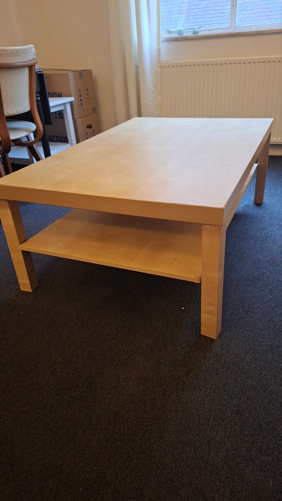 Gratis houten salontafel met gebruikerssporen, Ophalen