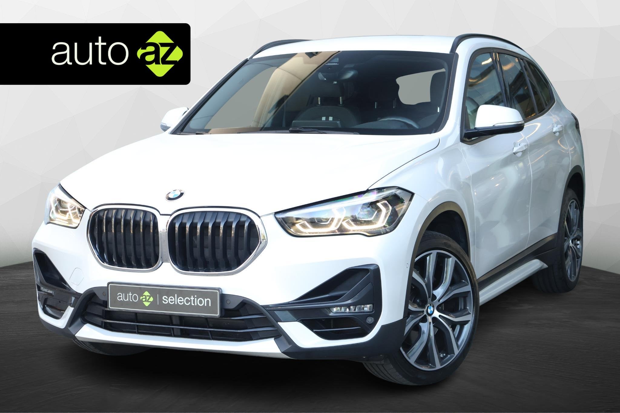 BMW X1 sDrive20i High Executive / Sport line / Cruise contro, 1998 cc, Euro 6, Leder en Stof, Wit