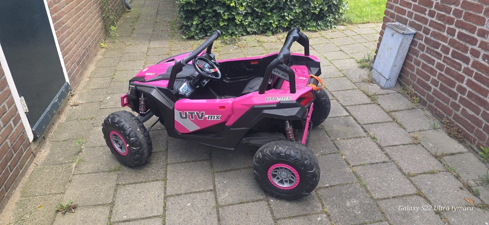Roze elektrische kinderbuggy met afstandsbediening, Ophalen of Verzenden, Gebruikt