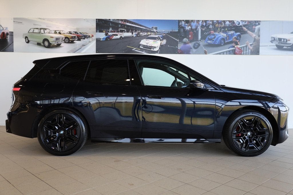 BMW iX xDrive45 | M Sportpakket Pro | Comfort Pack | Innovat, Auto's, BMW, Automaat, Stof, IX, Zwart