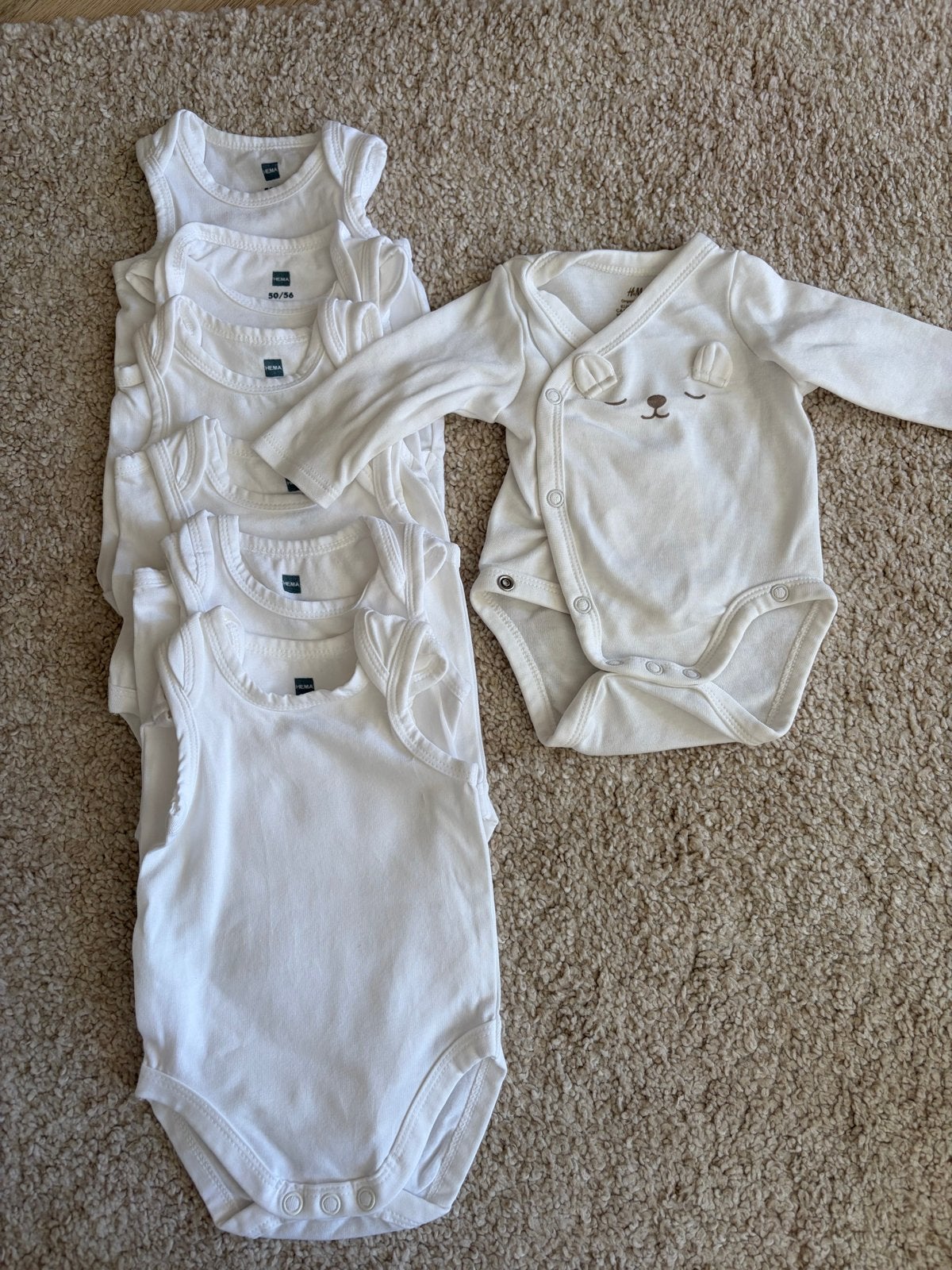 7 rompers van H&M en HEMA - Nooit gedragen maat 50, Ophalen of Verzenden, Nieuw, Jongetje of Meisje