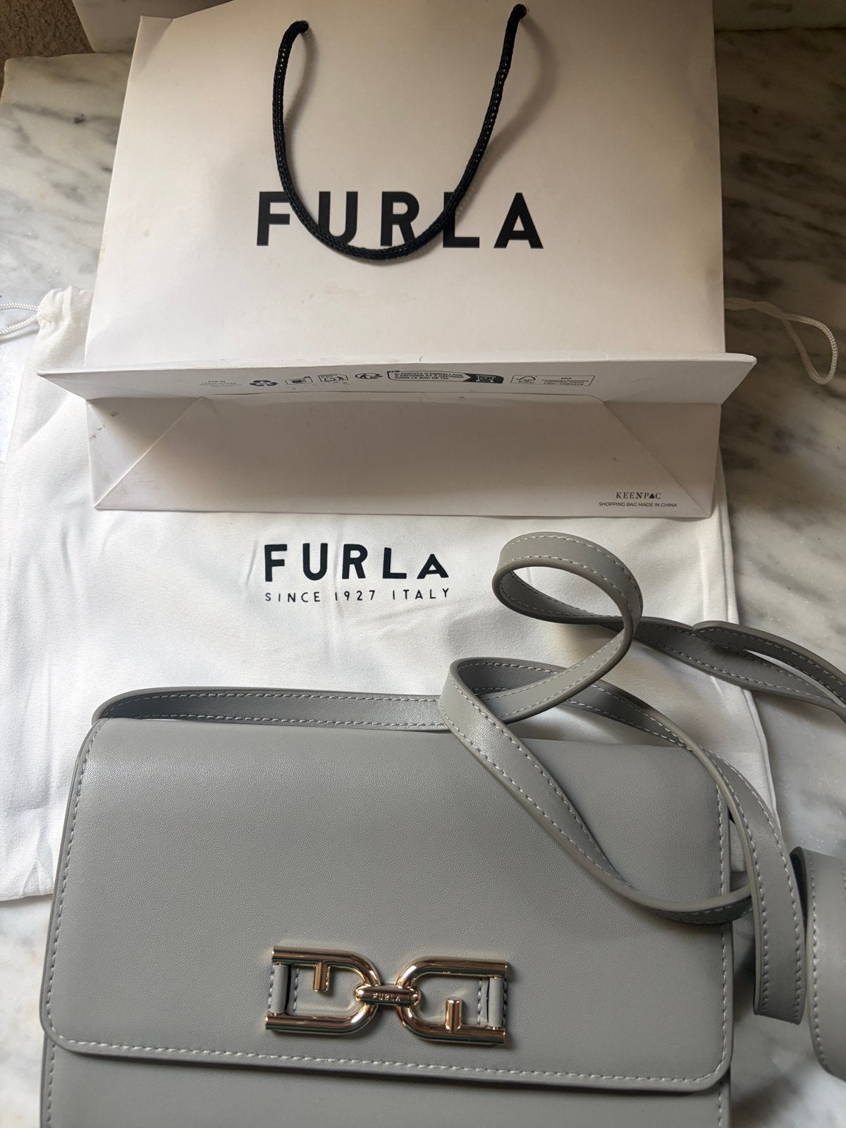 Furla Grijsblauwe Leren Beurs Tas Nieuw!, Ophalen of Verzenden, Zo goed als nieuw, Grijs, Overige typen